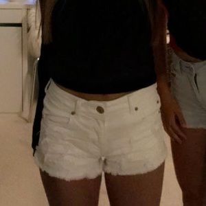 white distressed jean shorts